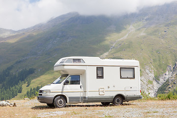 Image showing Camper van parked high in the mountains