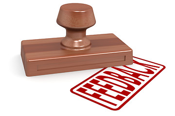 Image showing Wooden stamp feedback with red text