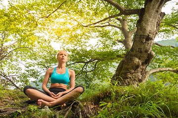 Image showing Woman relaxing in beautiful nature.