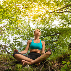 Image showing Woman relaxing in beautiful nature.