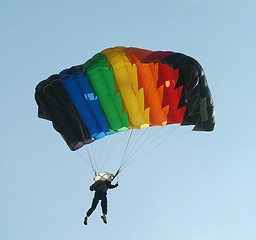 Image showing Parachutist with colourful parachute