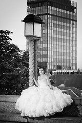 Image showing Bride posing next to street lamp bw
