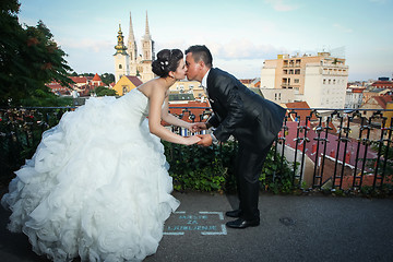 Image showing Newlyweds kissing
