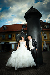 Image showing Newlyweds posing in front of August Senoa Monument