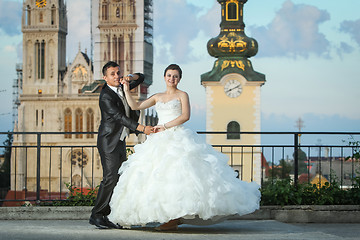 Image showing Bride and groom dancing
