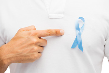 Image showing hand with blue prostate cancer awareness ribbon