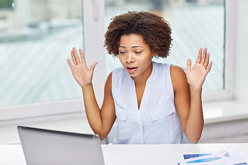 Image showing african woman with laptop at office