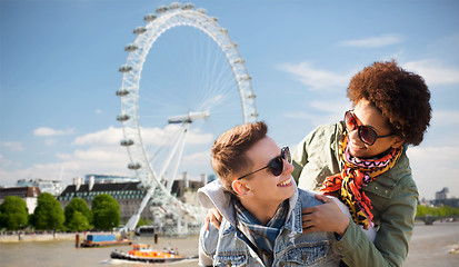 Image showing happy teenage couple having fun over london