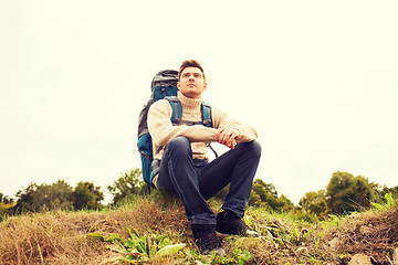 Image showing man with backpack hiking