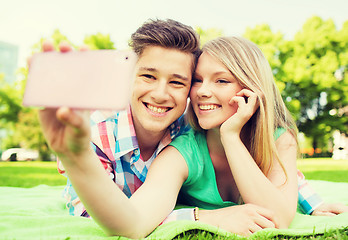 Image showing smiling couple in park