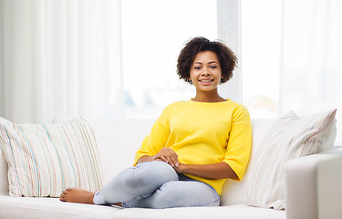 Image showing happy african american young woman at home