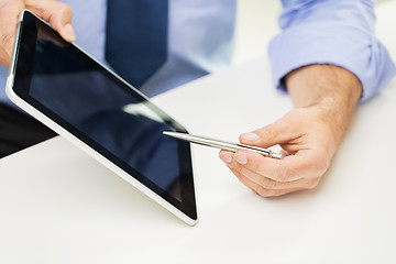 Image showing close up of businessman hands with tablet pc