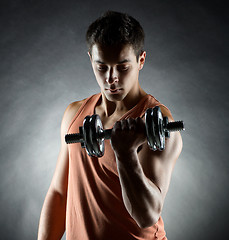 Image showing young man with dumbbell