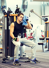 Image showing man exercising on gym machine