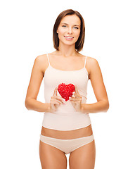 Image showing beautiful woman in cotton underwear and red heart