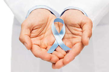 Image showing doctor hand with prostate cancer awareness ribbon