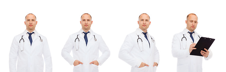 Image showing happy doctors with clipboard and stethoscope