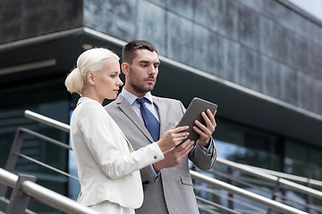 Image showing businesspeople with tablet pc outdoors