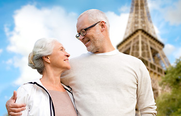 Image showing happy senior couple over paris eiffel tower
