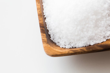 Image showing close up of white salt heap in wooden bowl