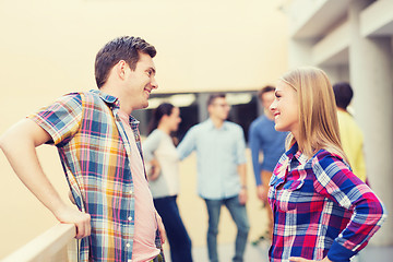 Image showing group of smiling students outdoors