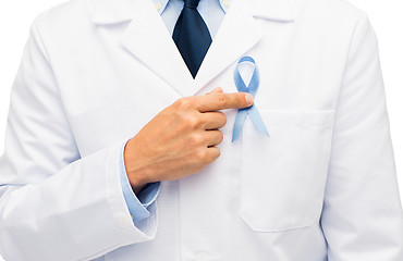 Image showing doctor hand with prostate cancer awareness ribbon