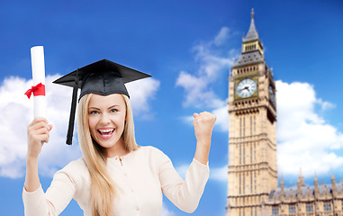 Image showing student in trencher cap with diploma over big ben