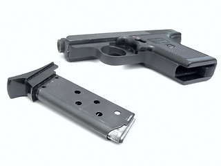 Image showing Gun and charger