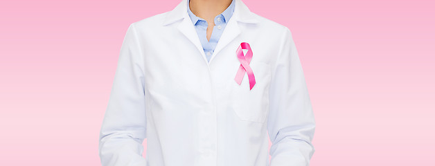 Image showing close up of doctor with cancer awareness ribbon