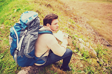 Image showing man with backpack hiking