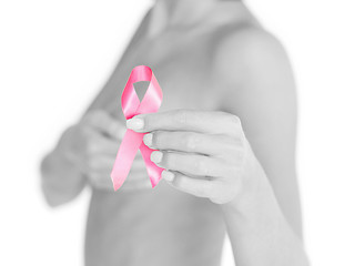 Image showing hand holding pink breast cancer awareness ribbon