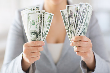 Image showing close up of woman hands holding us dollar money