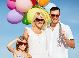 Image showing family with colorful balloons