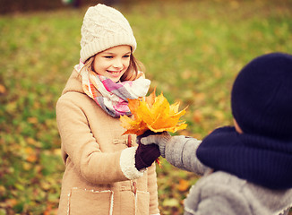 Image showing smiling children in autumn park