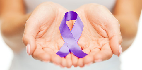 Image showing hands holding purple awareness ribbon