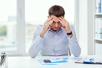 Image showing close up of businessman with smartphone