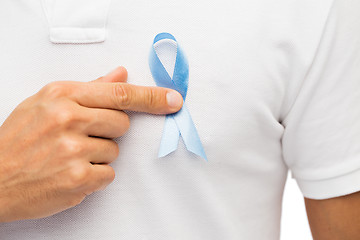 Image showing hand with blue prostate cancer awareness ribbon