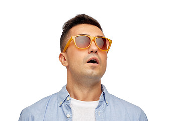 Image showing face of scared man in shirt and sunglasses