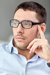 Image showing portrait of  businessman in eyeglasses at office