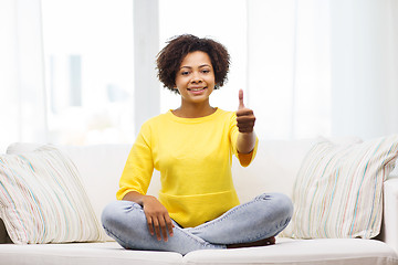 Image showing happy african american young woman at home