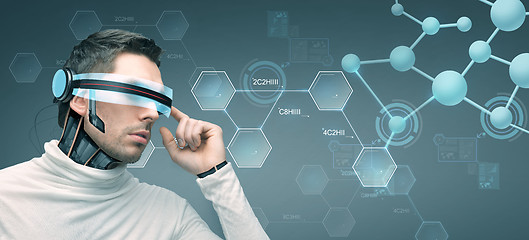 Image showing man with futuristic 3d glasses and sensors