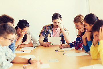 Image showing group of students with papers