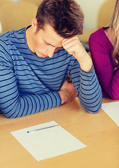 Image showing group of students with papers