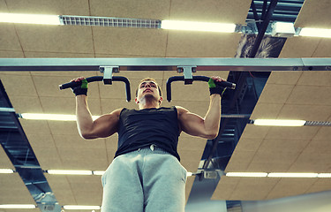 Image showing young man exercising in gym