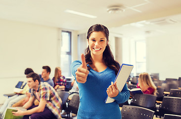 Image showing group of smiling students in lecture hall