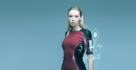Image showing beautiful futuristic woman with virtual projection