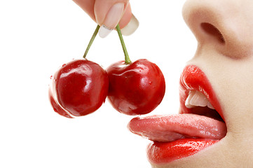 Image showing cherry, lips and tongue
