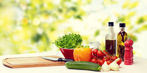 Image showing vegetables, spices and kitchenware on table