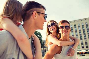 Image showing smiling couple having fun in city