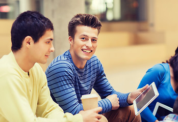 Image showing group of students with tablet pc and coffee cup